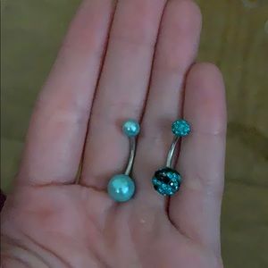 Two Blue belly button rings